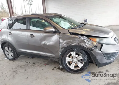 2011 Kia Sportage Lx z USA, uszkodzony, nr VIN KNDPBCA28B7083746